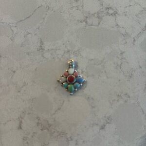 Silver slider with multicolored stones